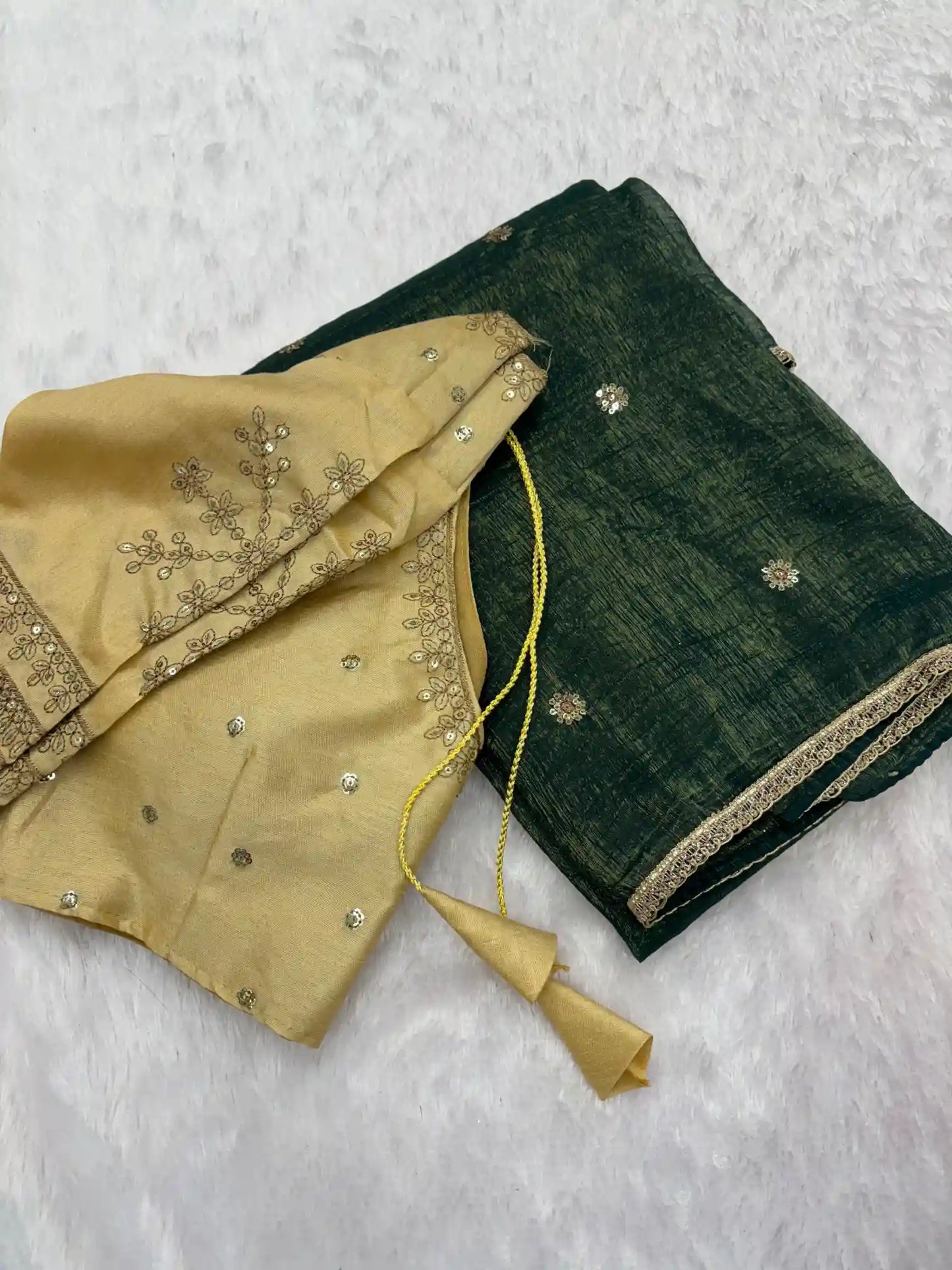 Exclusive Bottle Green Shimmery Tissue Silk Saree