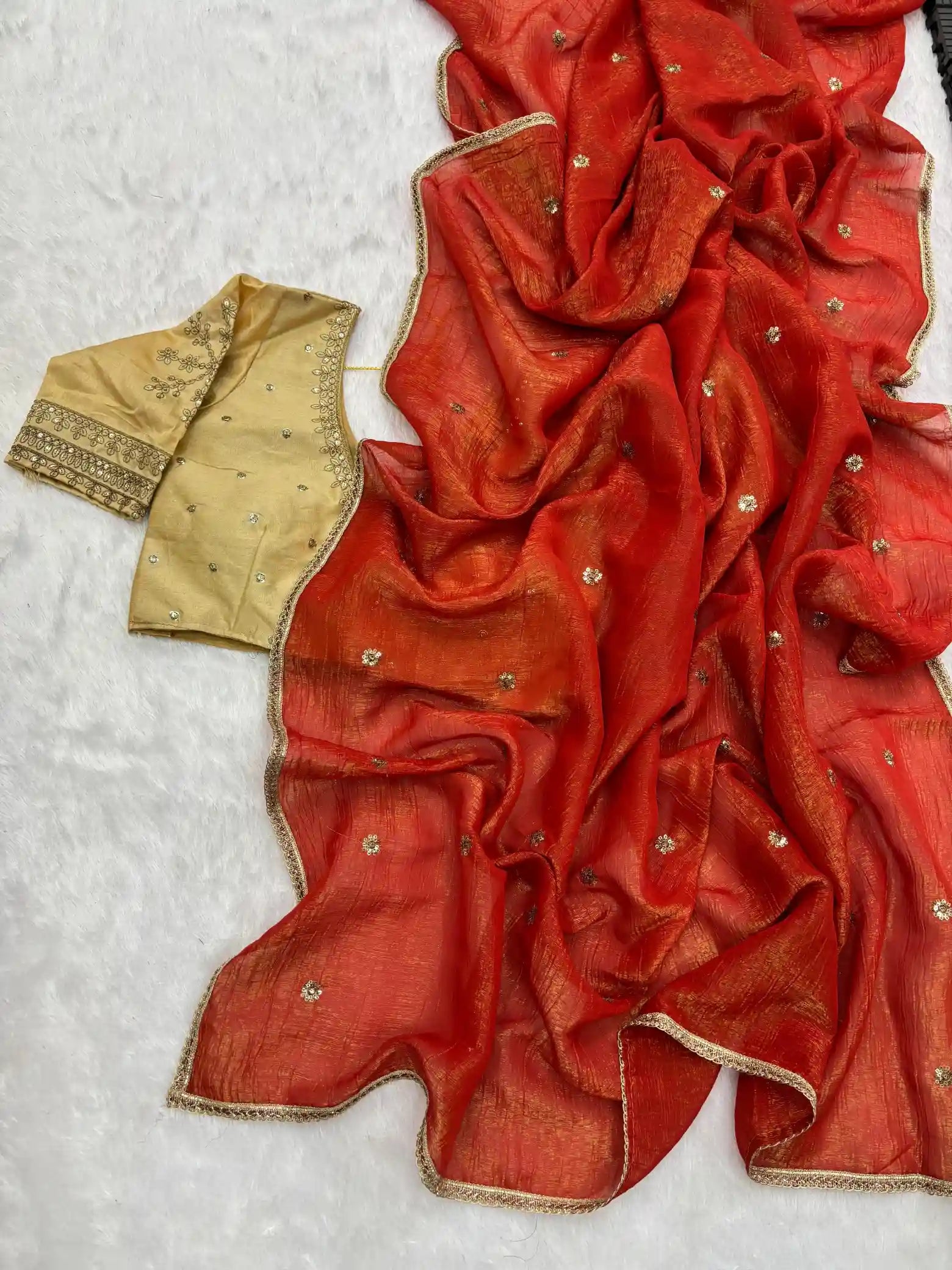 Exclusive Dark Orange Shimmery Tissue Silk Saree