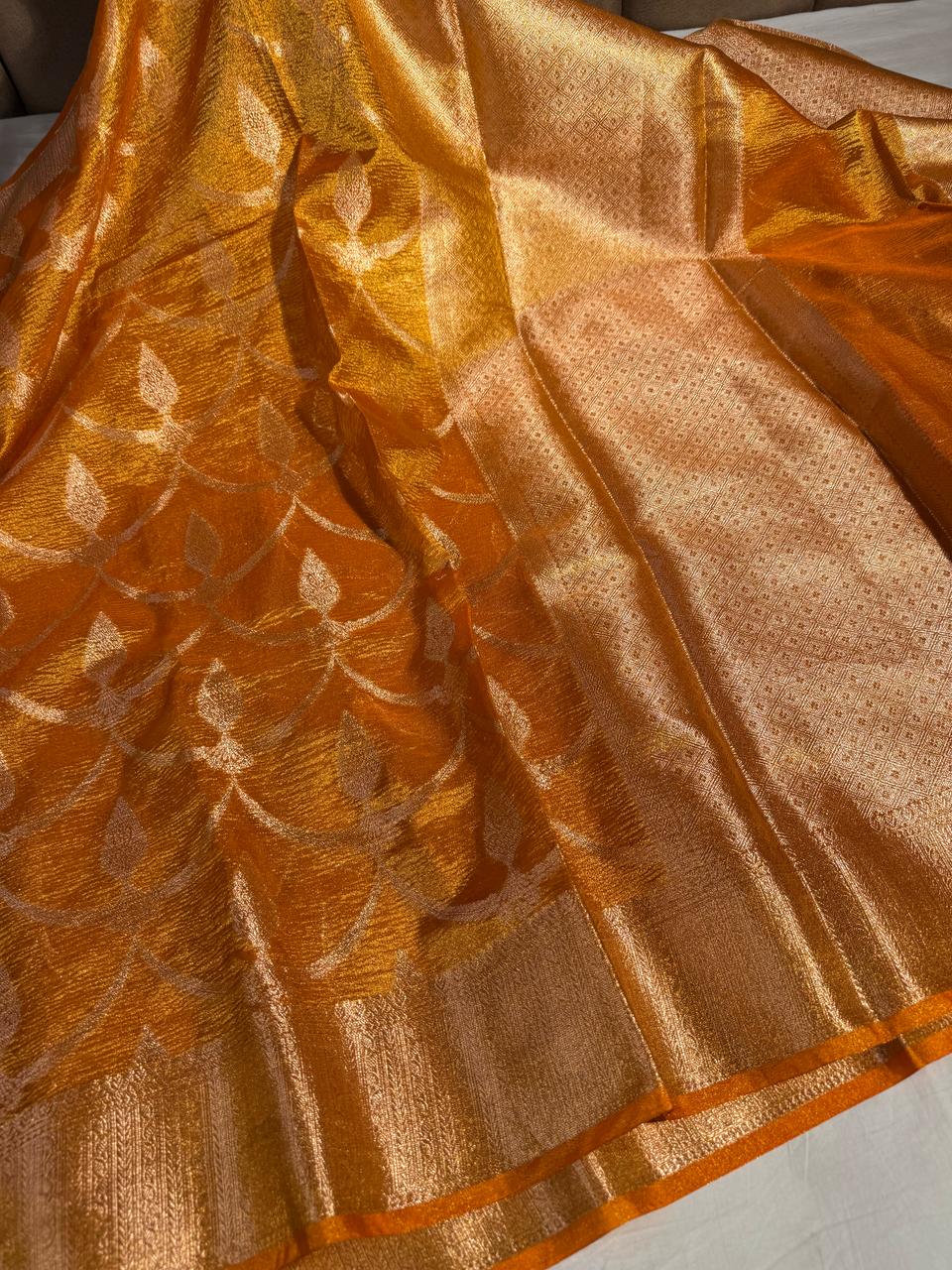 Eye Catching Light Orange Crushed Tissue Silk Banarasi Saree