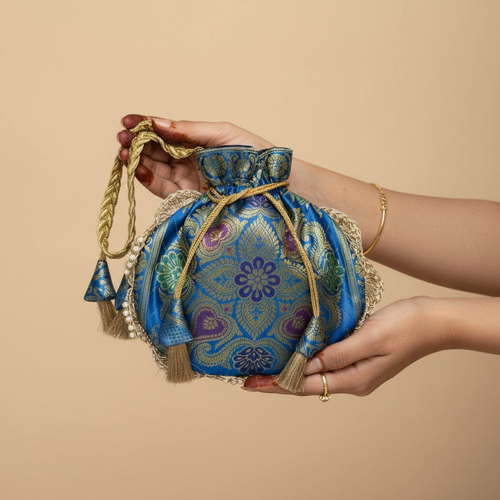 Firozi Blue Eccentric Lace Work Banarasi Potli Bags