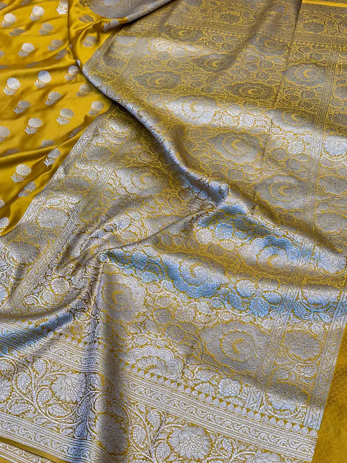 Goldish Yellow Eccentric Motifs Weave Mashru Katan Silk Saree