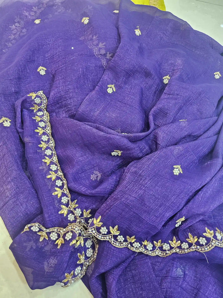 Handwork Purple shade shimmery tissue saree with lemon blouse