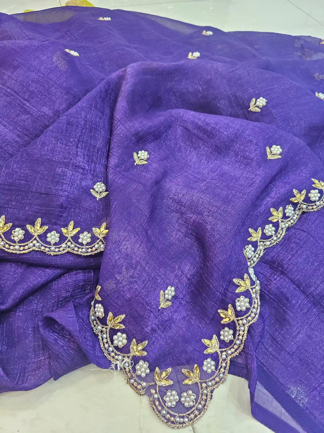 Handwork Purple shade shimmery tissue saree with lemon blouse