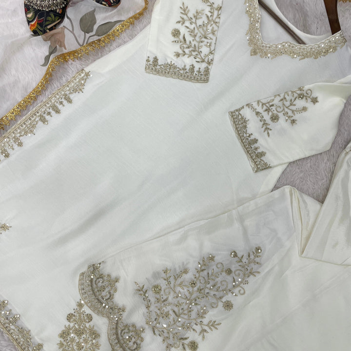 Heavy chinon work top with flair Gharara and organza dupatta