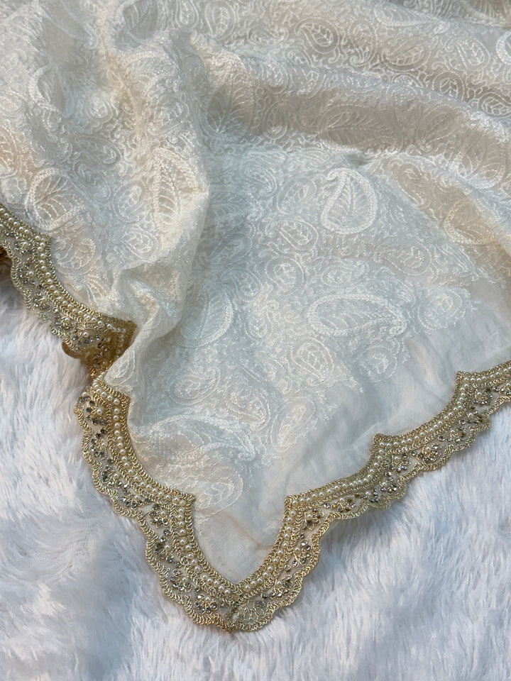 Pure Mul Cotton chikankari saree with motiwork lace border and scelup pallu