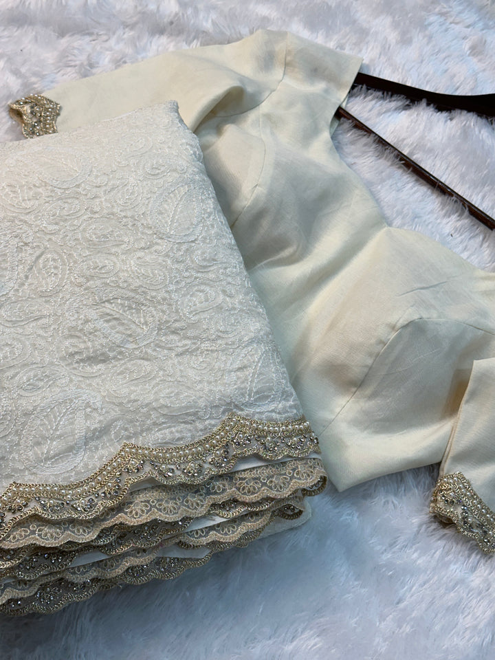 Pure Mul Cotton chikankari saree with motiwork lace border and scelup pallu