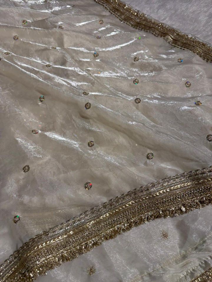Ivory shimmery tissue silk designer saree