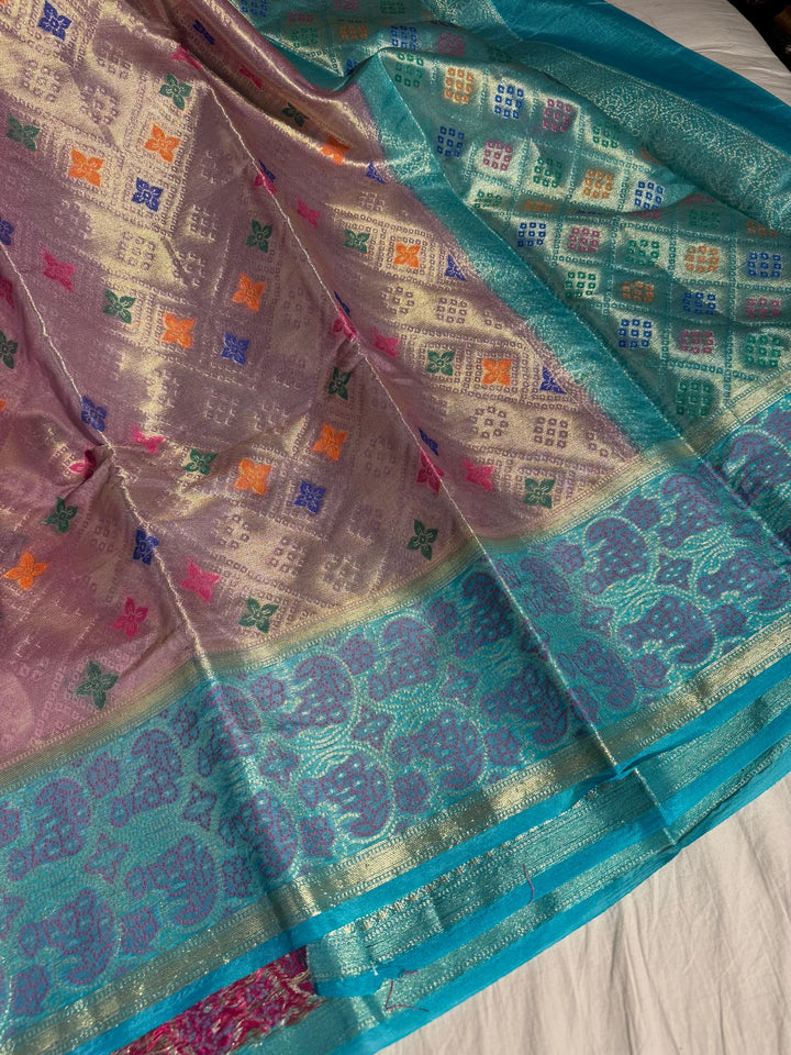 Light pink tissue organza silk saree with rich pallu and blouse