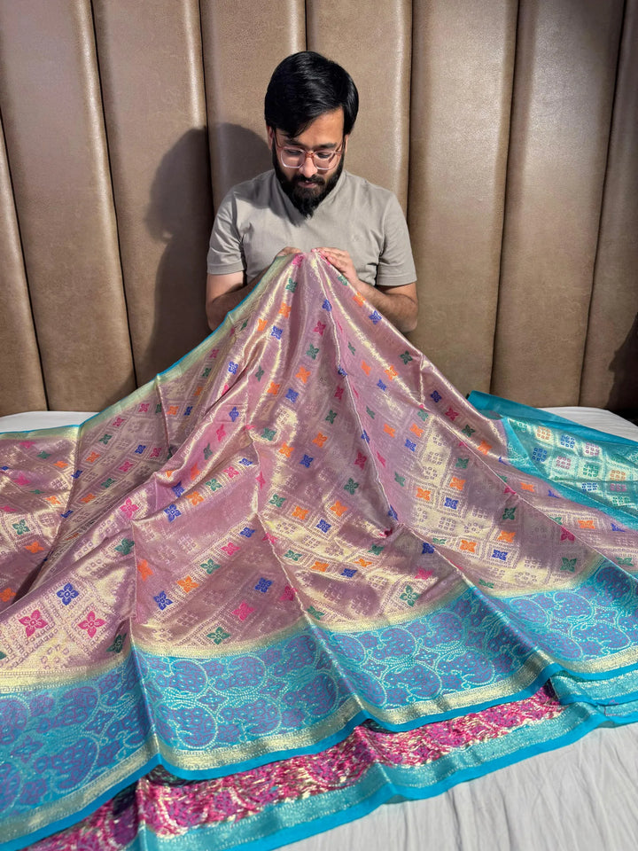 Light pink tissue organza silk saree with rich pallu and blouse