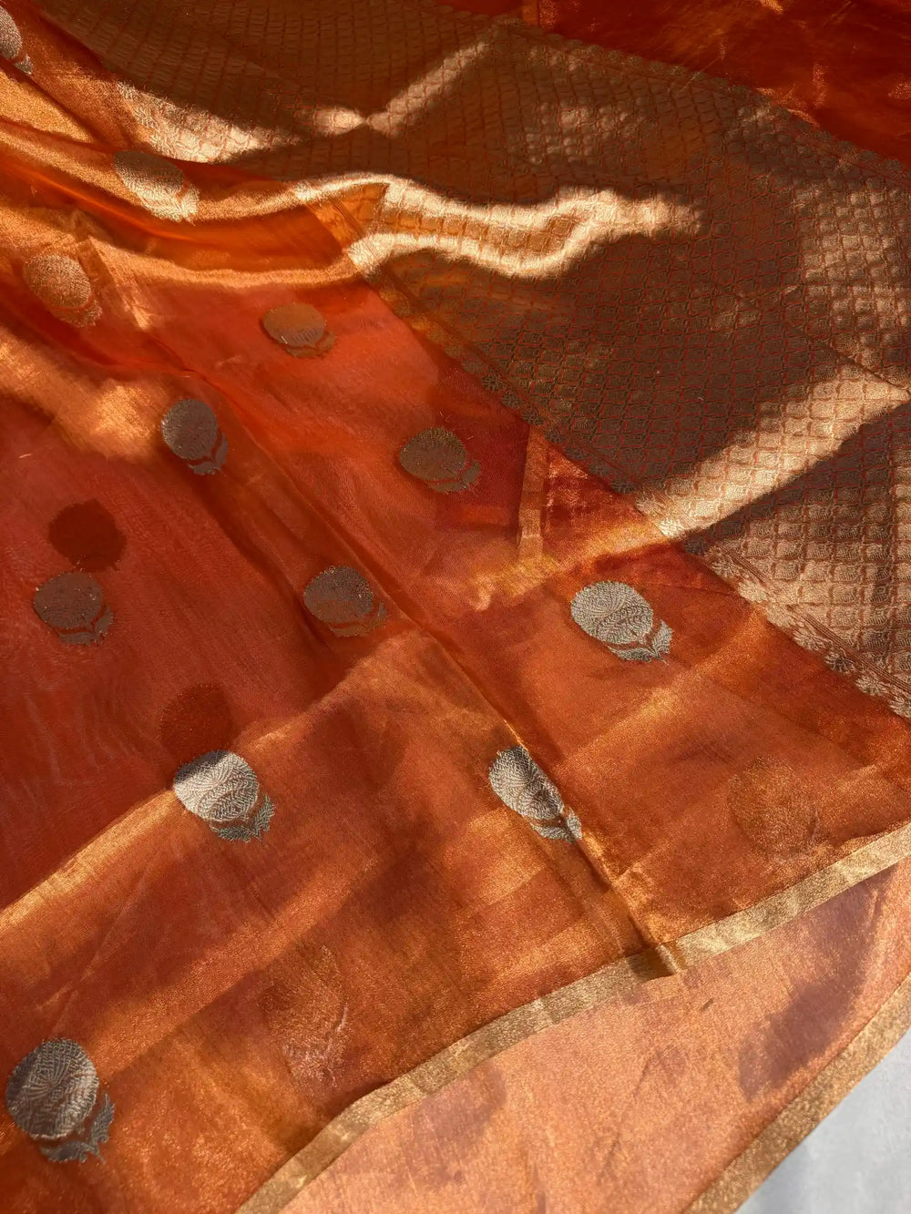 Metallic Orange 100% Pure tissue silk handweaved saree with rich pallu and blouse