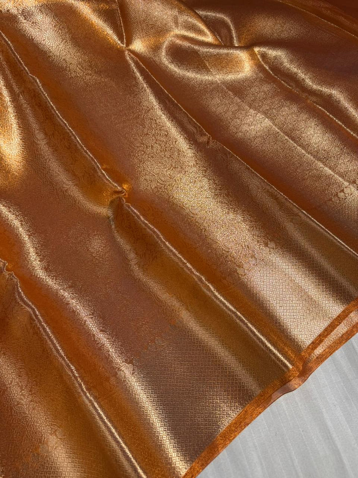Metallic Orange Kanjivaram Bridal Tissue Silk Saree with Rich pallu and blouse