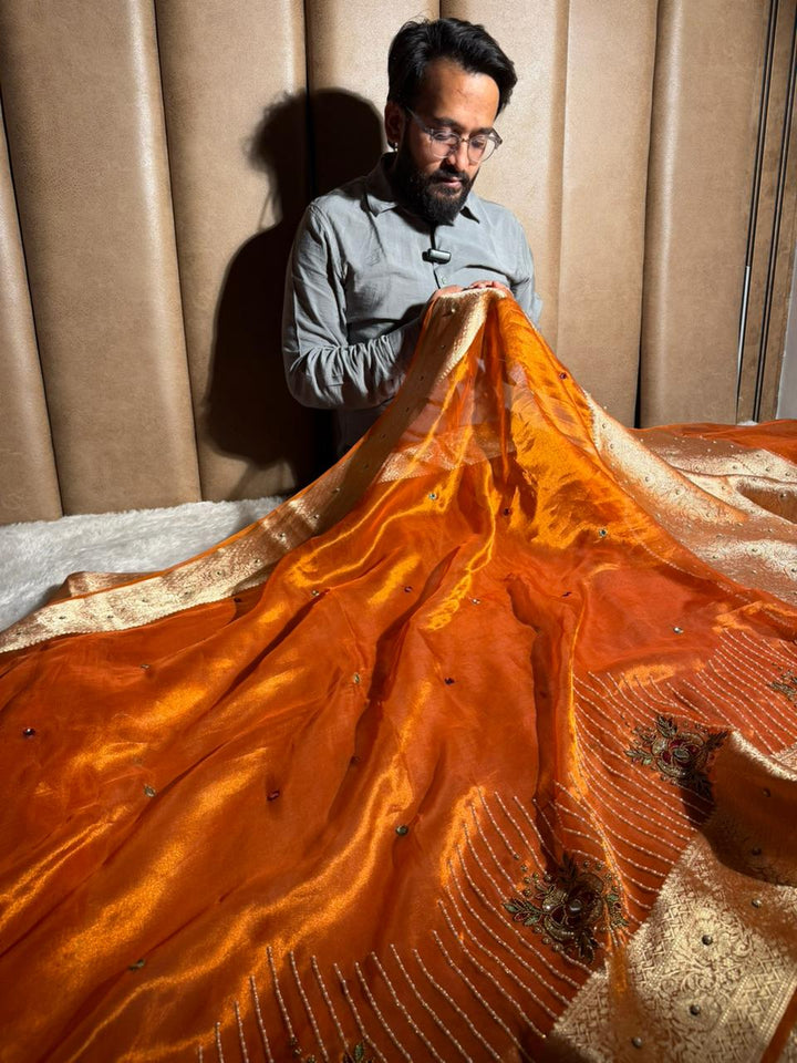 Metallic Orange Pure Tissue Silk Handwork Saree