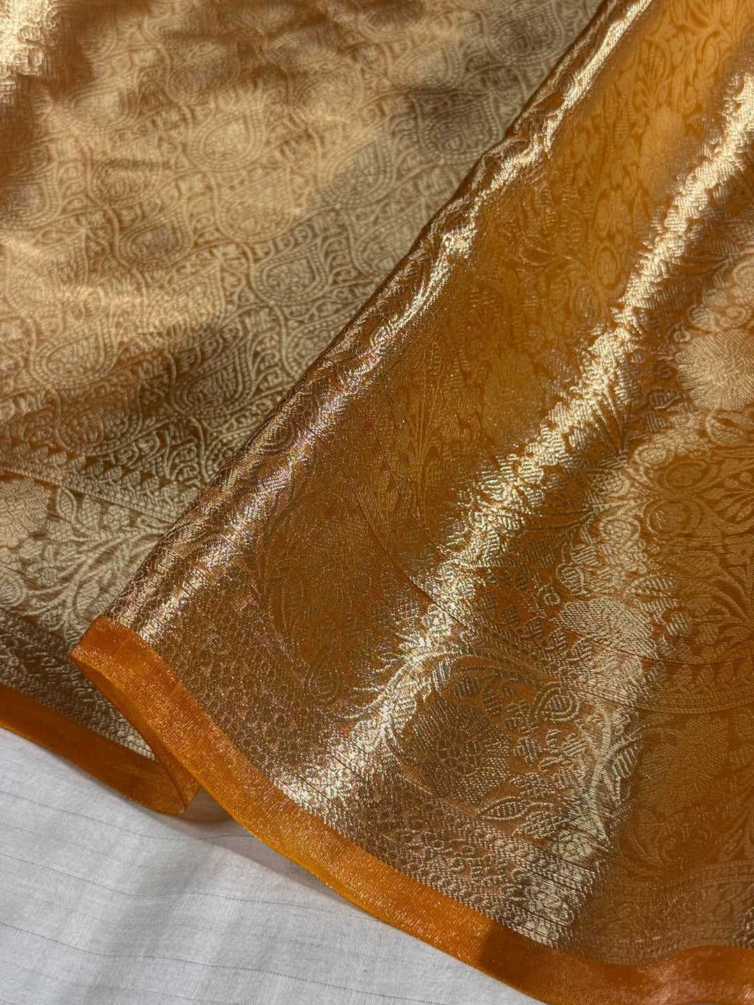 Metallic Orange Tissue Silk Intricately Woven Brocade Banarasi Saree