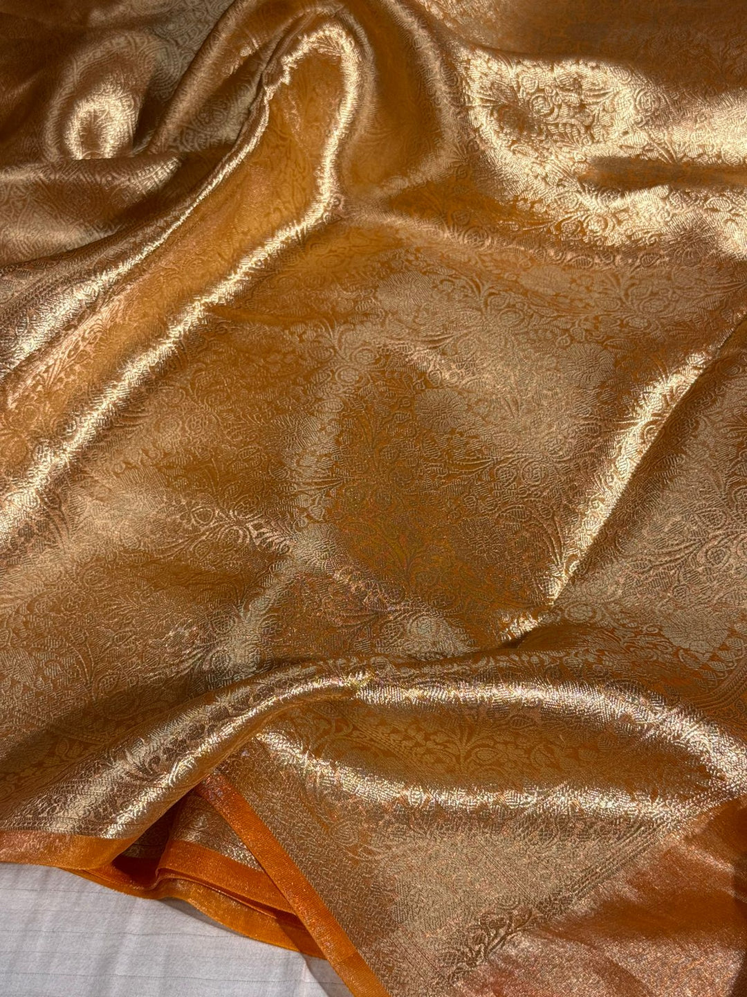 Metallic Orange Tissue Silk Intricately Woven Brocade Banarasi Saree