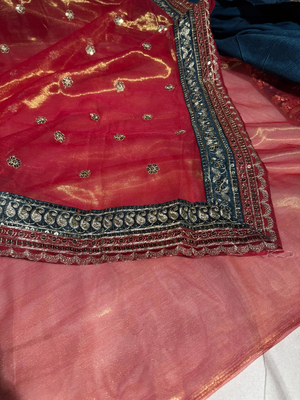 Metallic pink shimmery tissue silk designer saree