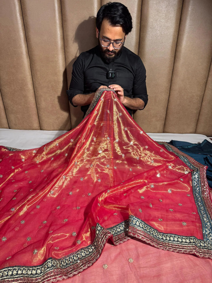 Metallic pink shimmery tissue silk designer saree