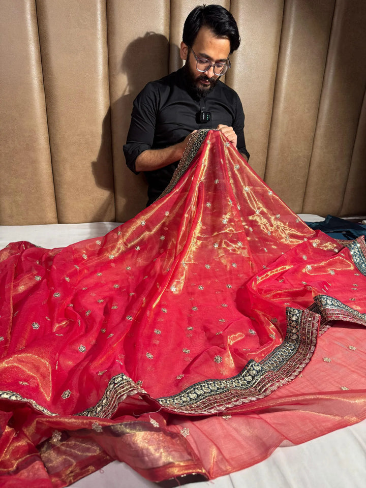 Metallic pink shimmery tissue silk designer saree