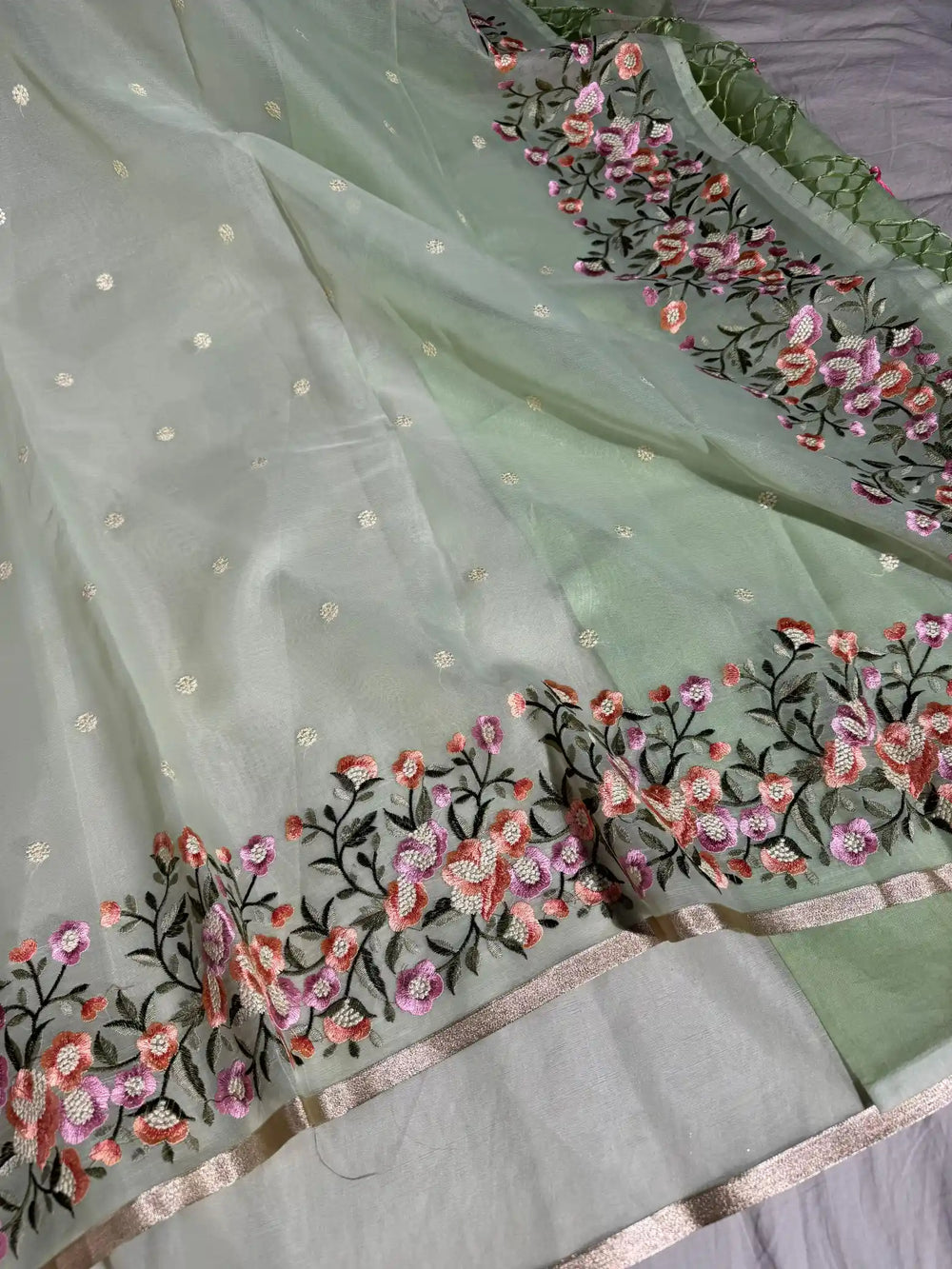 Mint Green Banarasi organza silk with NoorTaar technique border and pallu work with premium tassels