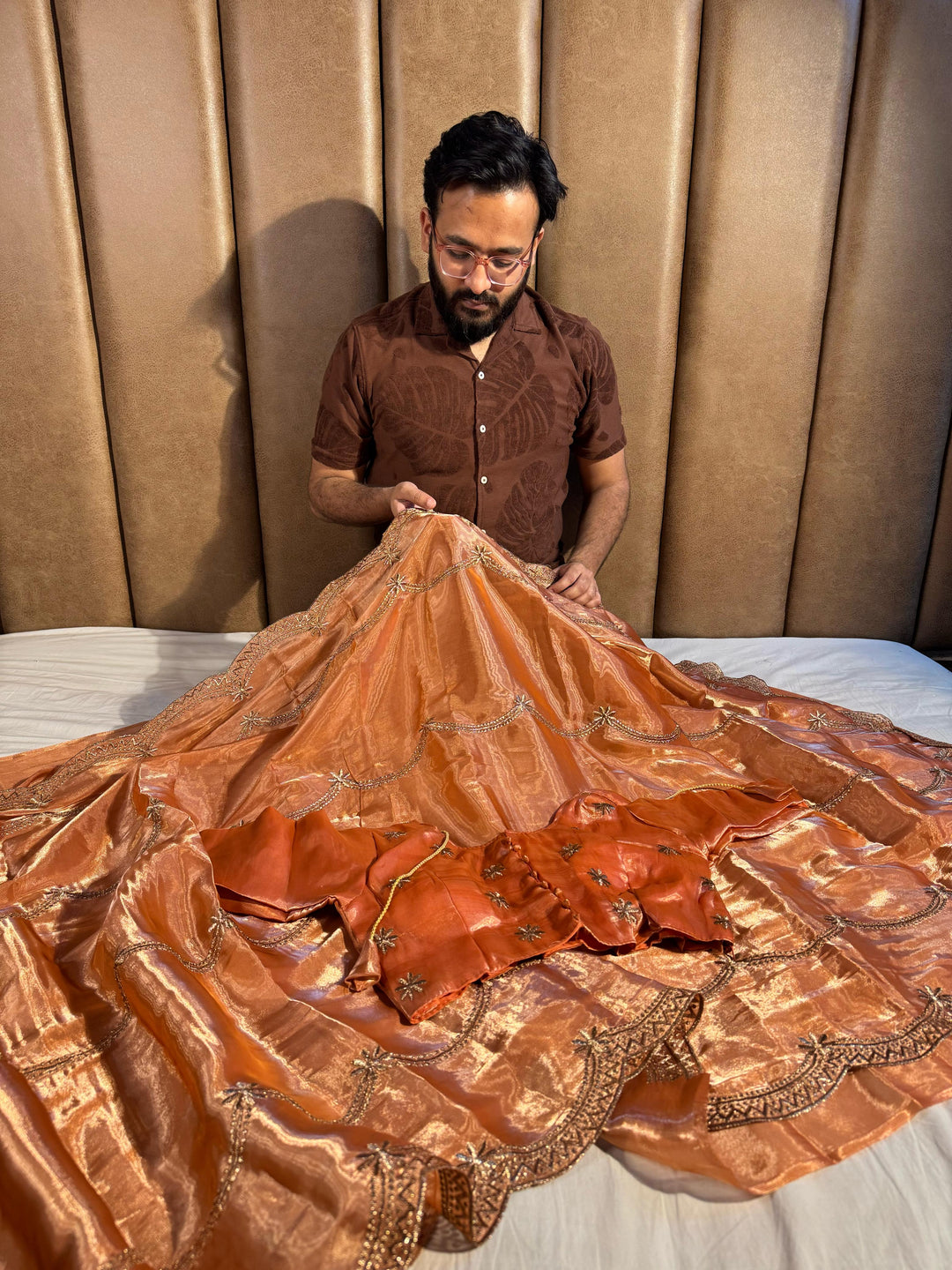 Orange Shade Shimmery Tissue Silk Saree with Lace Work