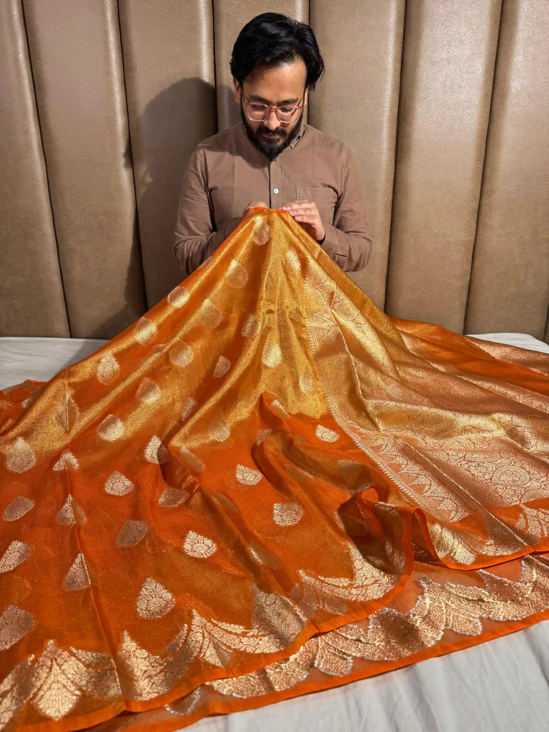 Orange Tissue banarasi saree with rich pallu and blouse