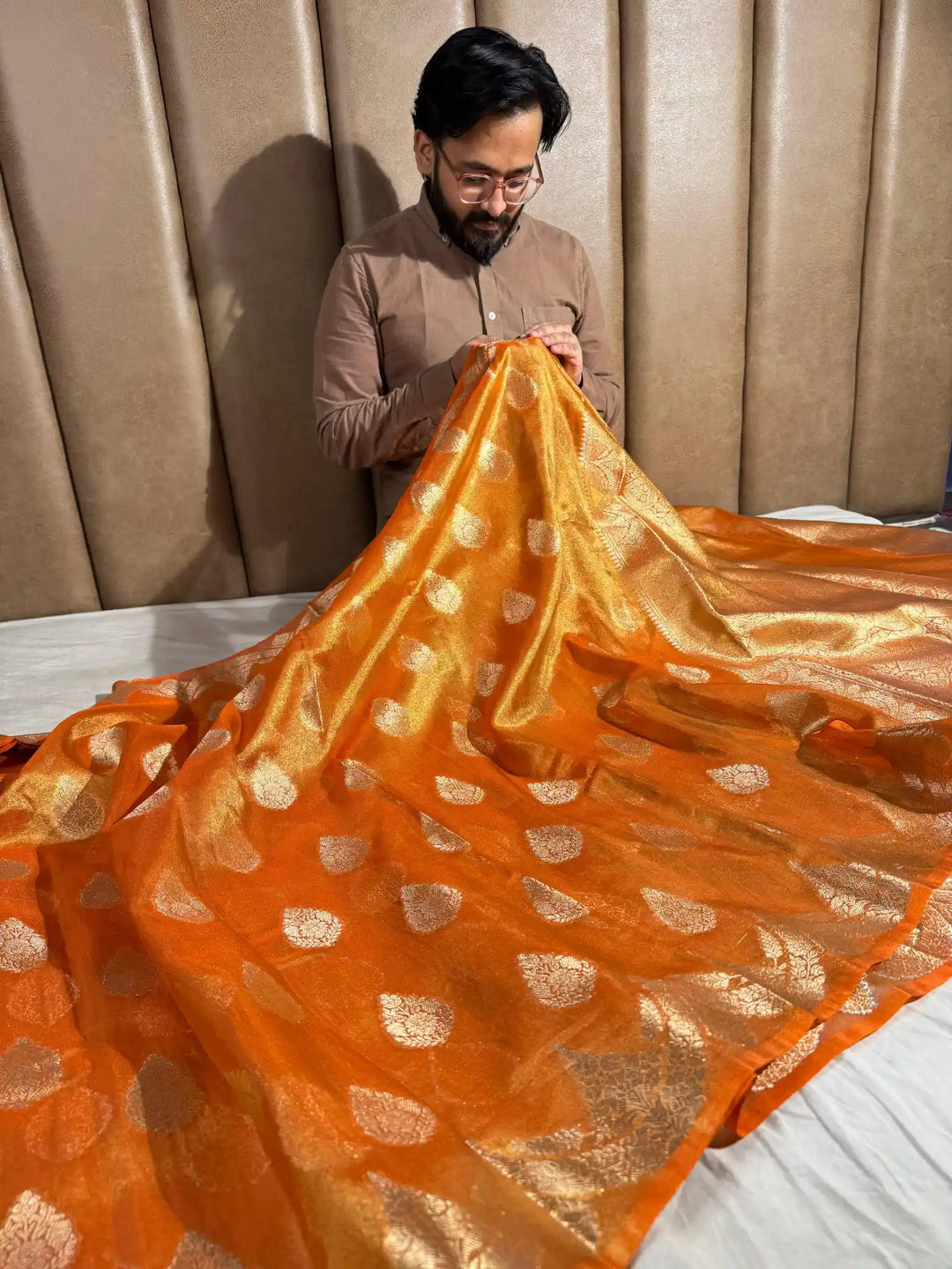 Orange Tissue banarasi saree with rich pallu and blouse