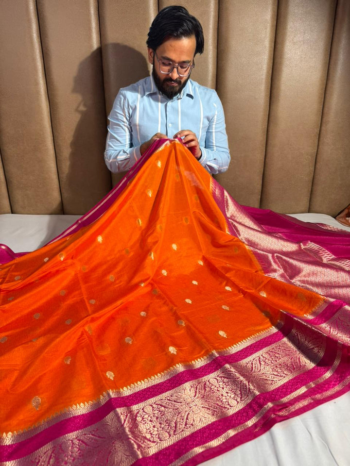 Orange shade chiniya silk saree with rich pallu and Contrast blouse