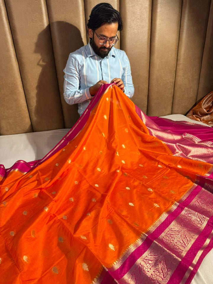 Orange shade chiniya silk saree with rich pallu and Contrast blouse
