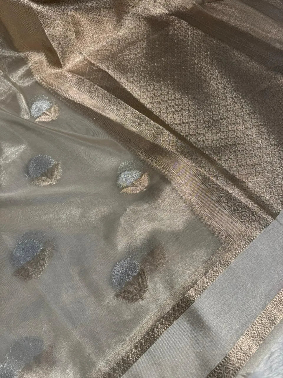 Pearl white tissue silk saree with rich pallu and blouse