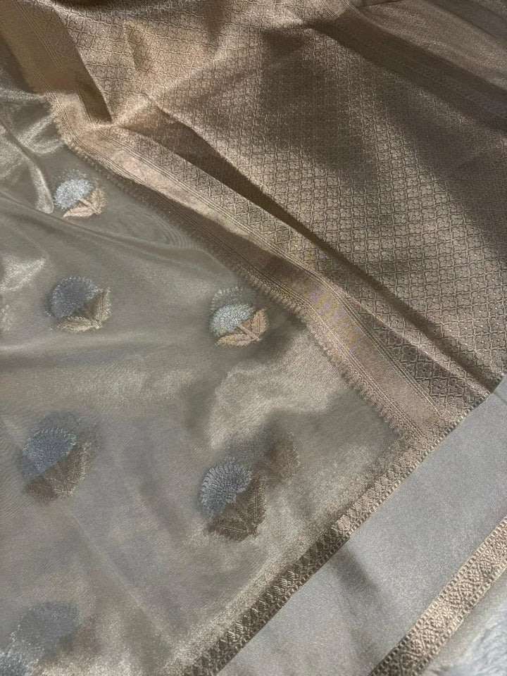 Pearl white tissue silk saree with rich pallu and blouse