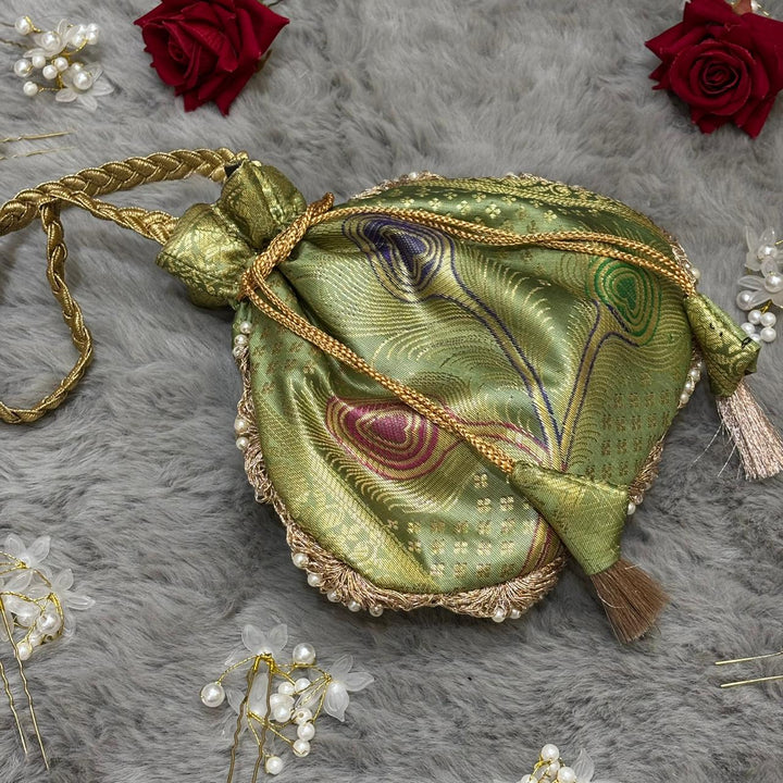 Pista Green Beautiful Lace Work Banarasi Potli Bags