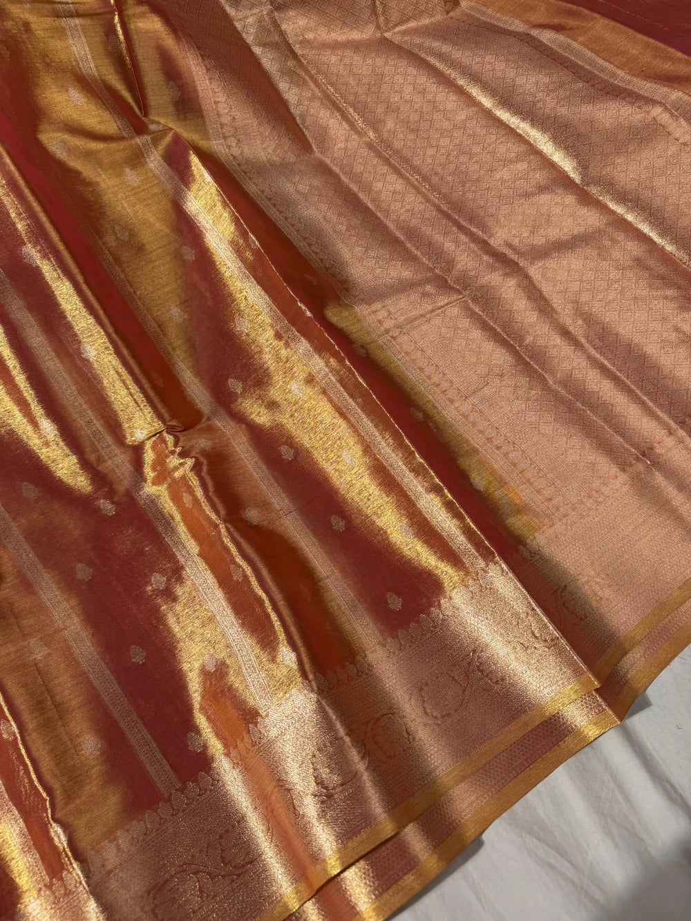Premium banarasi orangish copper tissue silk saree with rich pallu and blouse