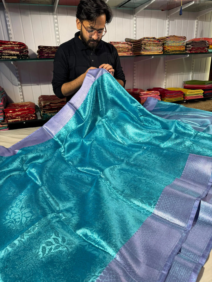 Premium blue tissue silk saree with soft zari and rich pallu