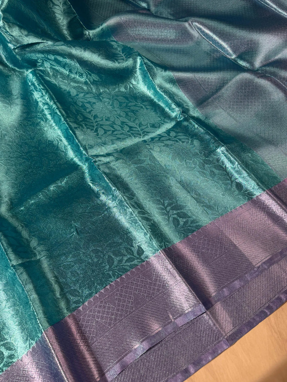 Premium blue tissue silk saree with soft zari and rich pallu