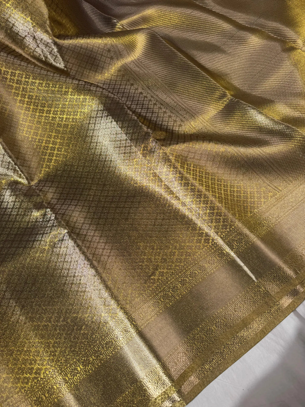 Premium tissue silk saree with soft zari and rich pallu
