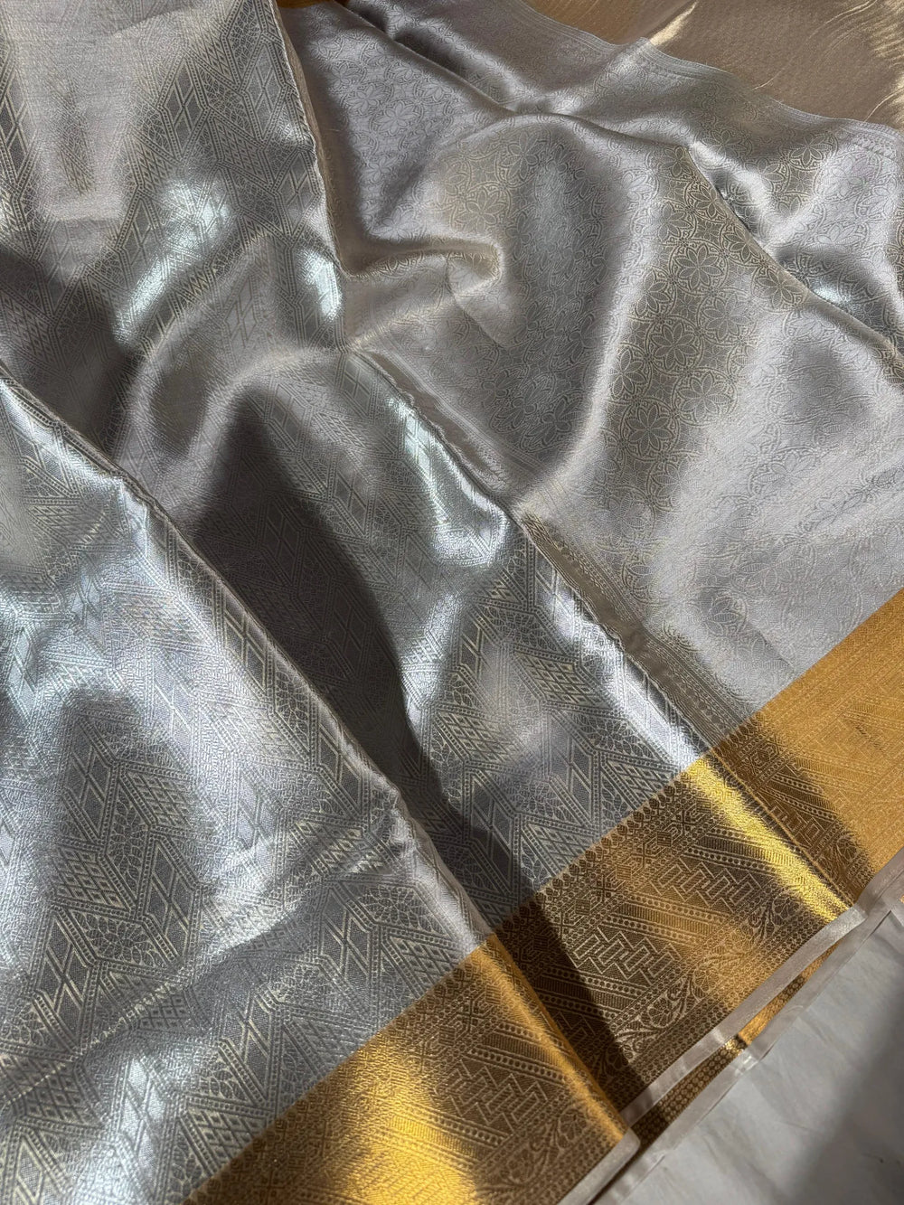Pure brocade champagne tissue silk saree with rich pallu and blouse