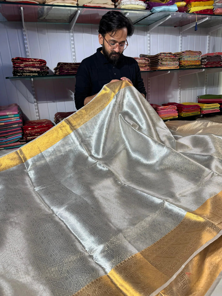 Pure brocade champagne tissue silk saree with rich pallu and blouse