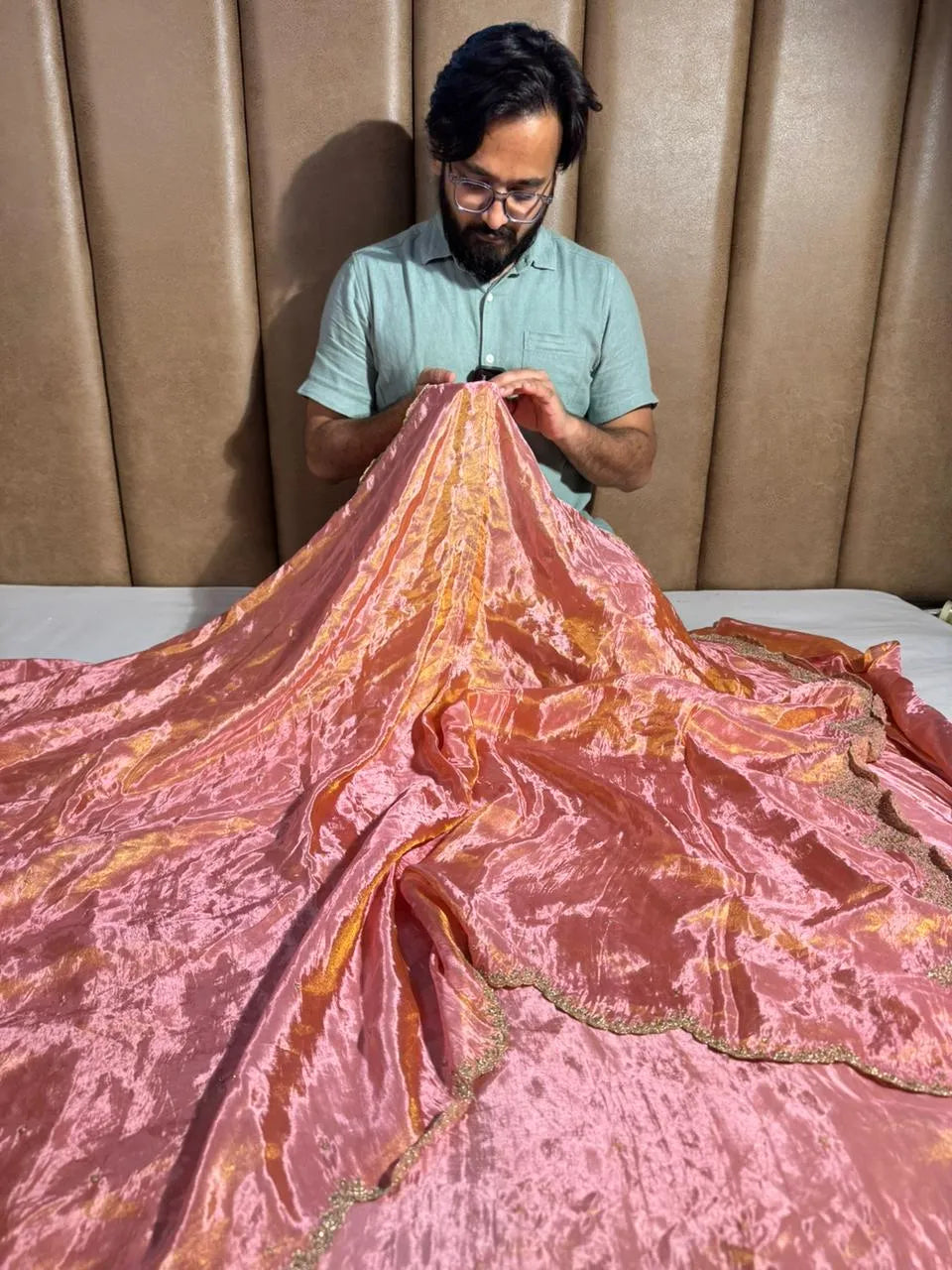 Pure shimmery tissue silk saree in dhoop chaw shade and classic katdana handwork with scaleup border
