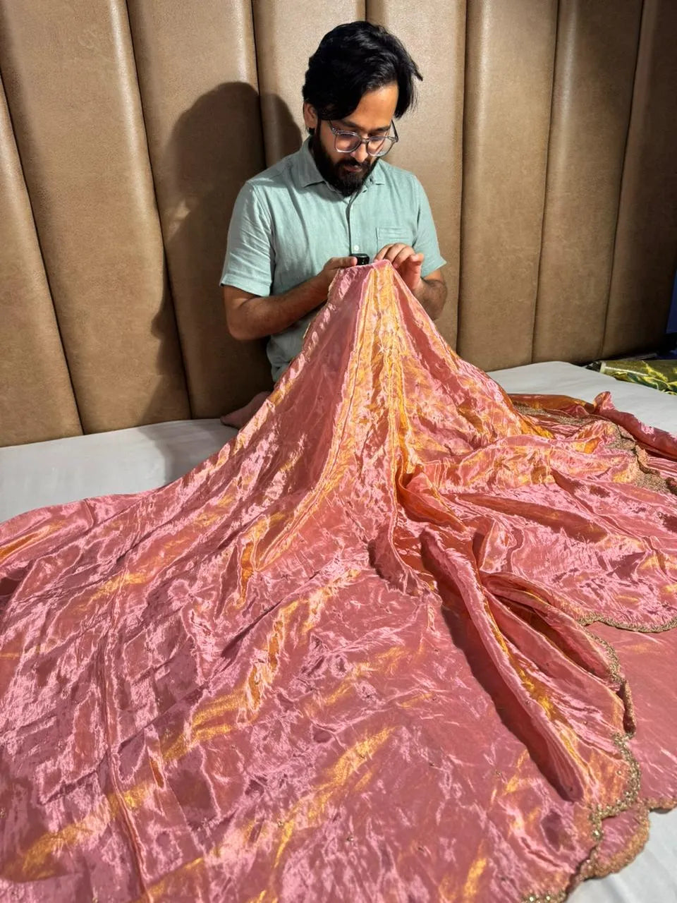 Pure shimmery tissue silk saree in dhoop chaw shade and classic katdana handwork with scaleup border