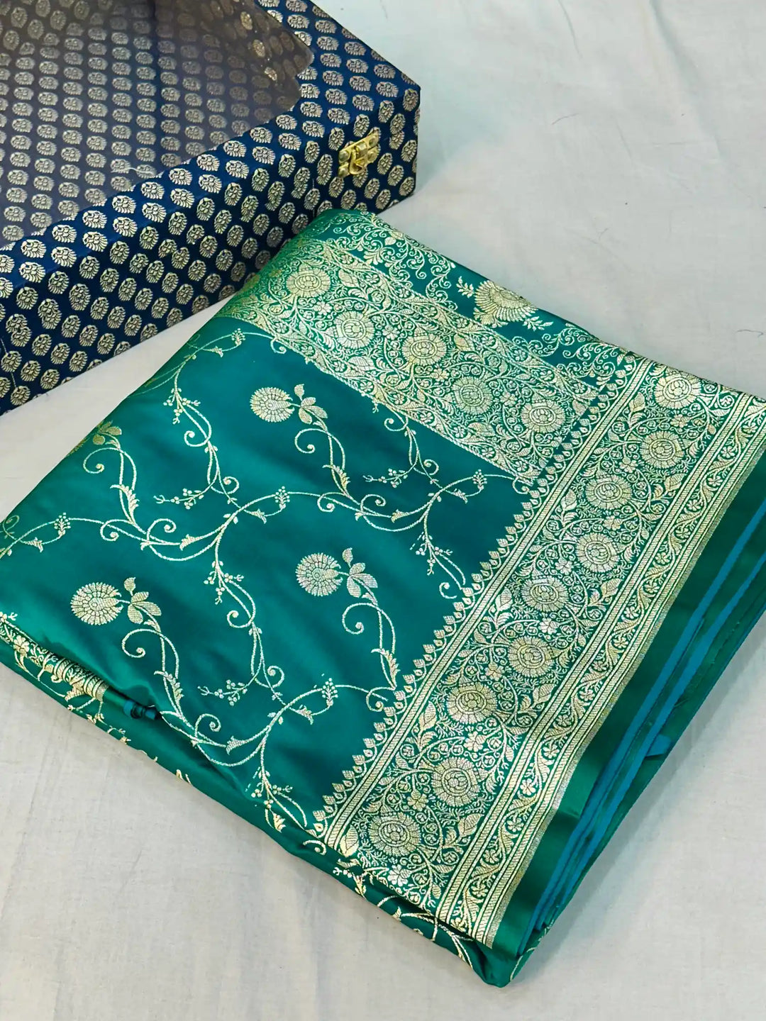 Rama Green Satin Silk Saree with Rich Texture Design and Classical Pallu