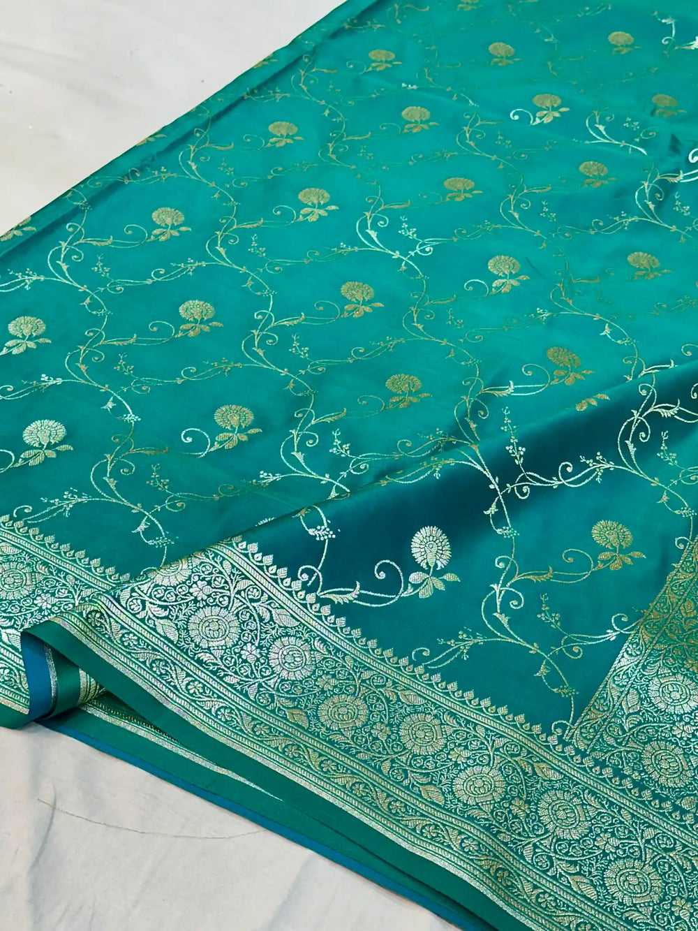 Rama Green Satin Silk Saree with Rich Texture Design and Classical Pallu