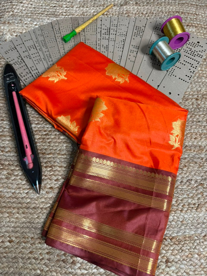 Bright orange floral buta Softsilk saree