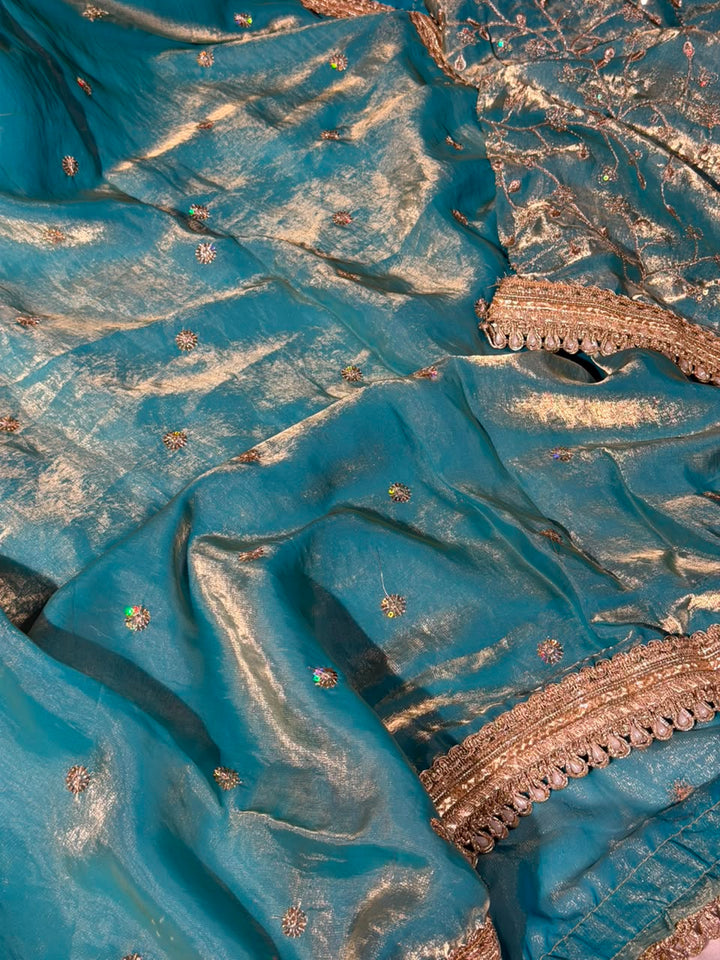 Sea Green Shimmery Tissue Silk Embroidered Lace Work Saree