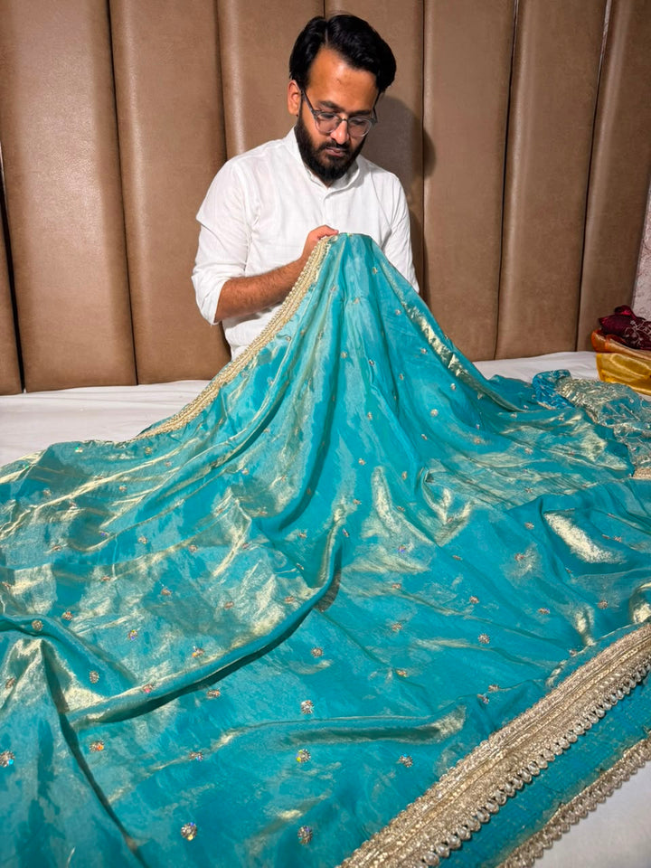 Sea Green Shimmery Tissue Silk Embroidered Lace Work Saree