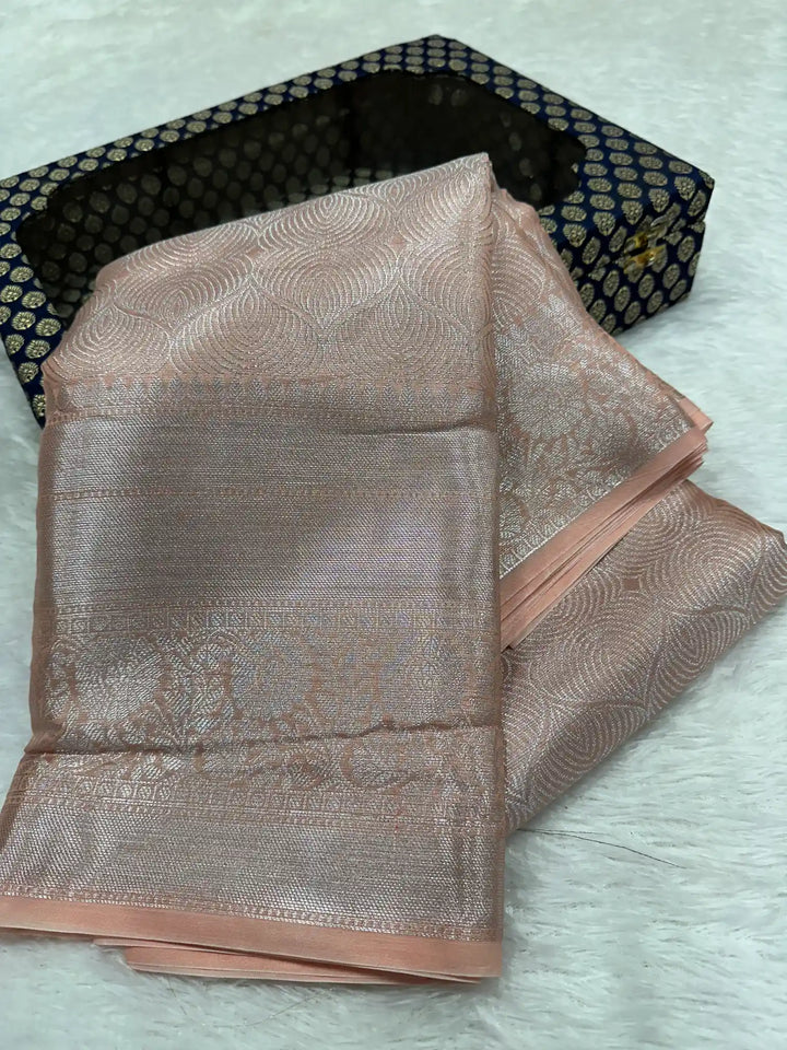 Silver zari embossed weave peach tissue saree