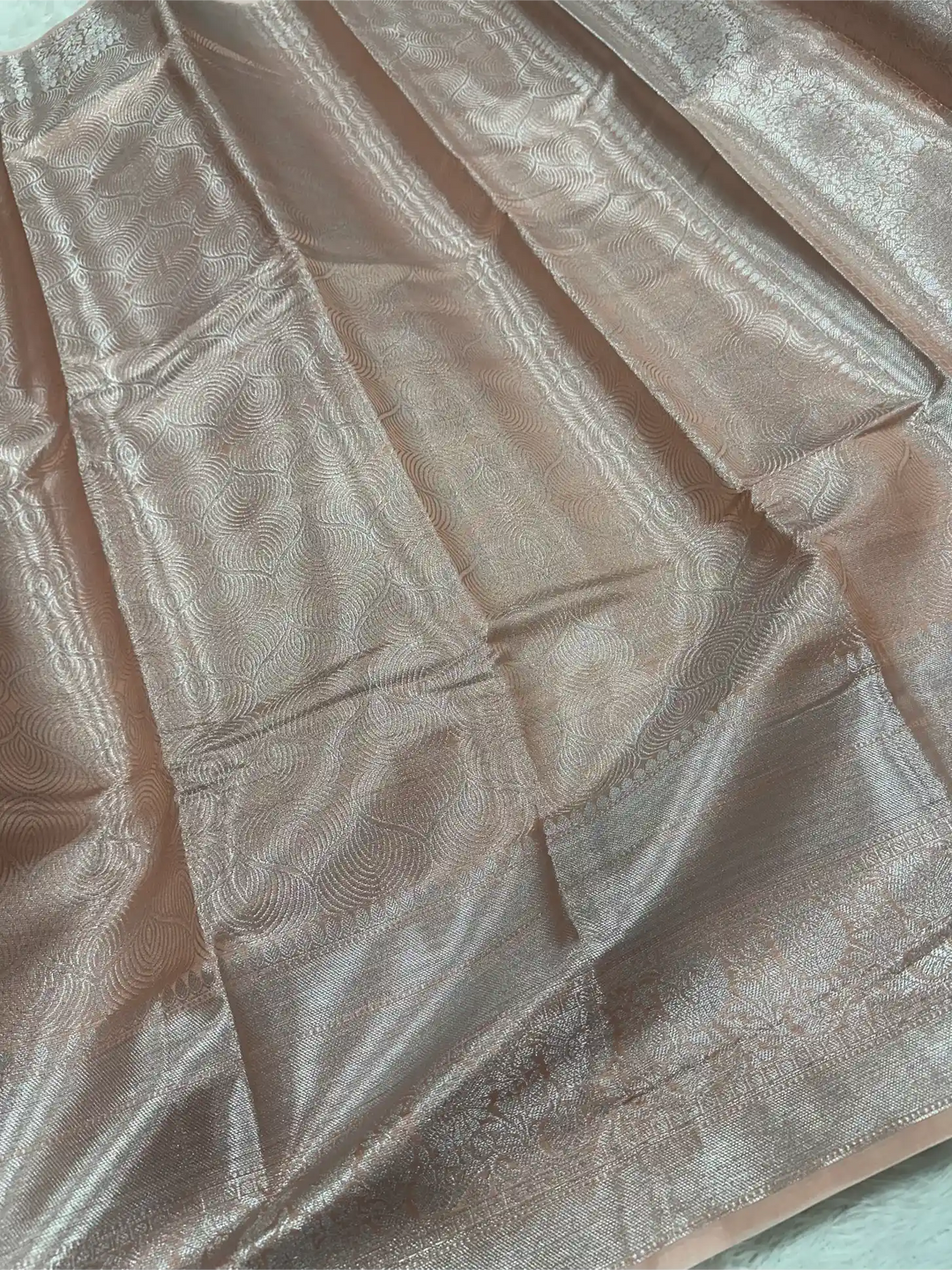 Silver zari embossed weave peach tissue saree
