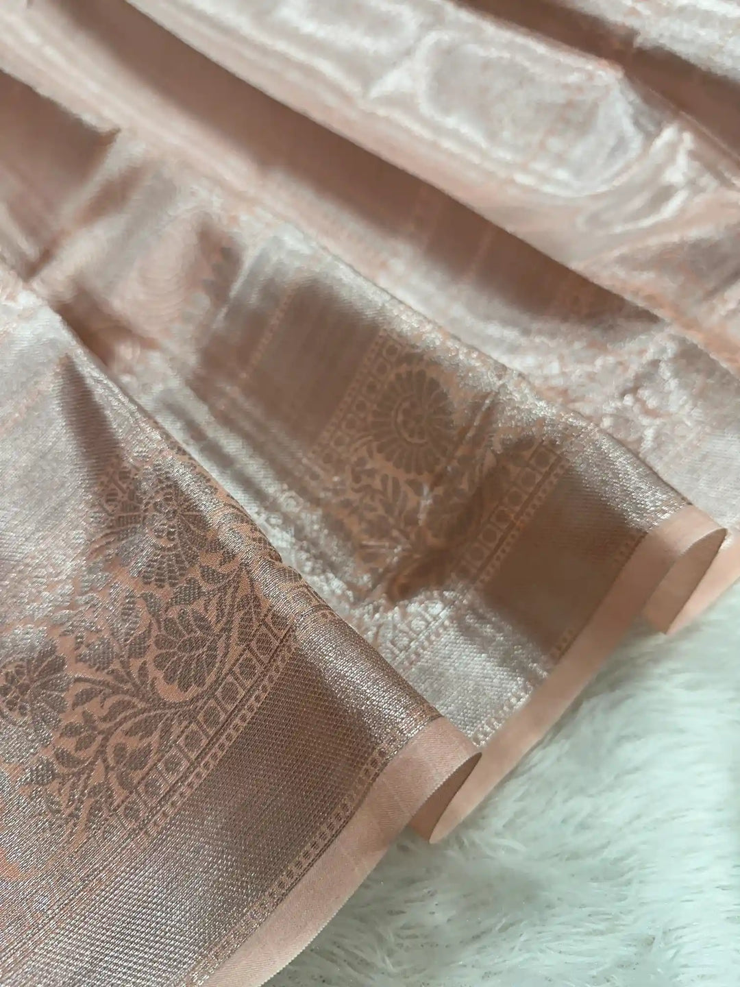Silver zari embossed weave peach tissue saree