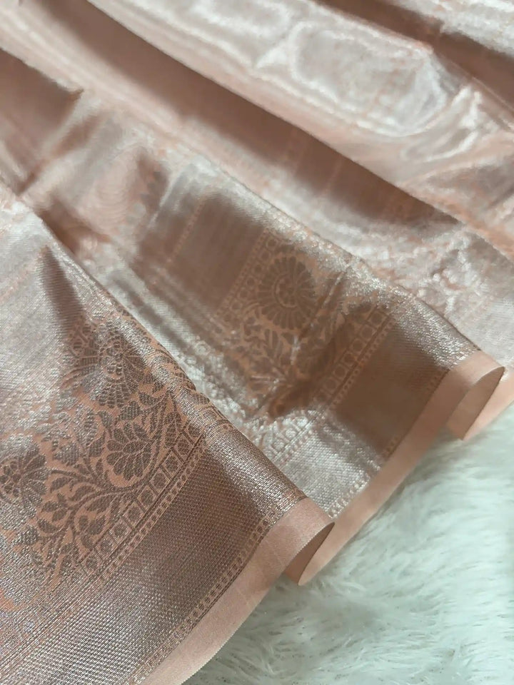 Silver zari embossed weave peach tissue saree