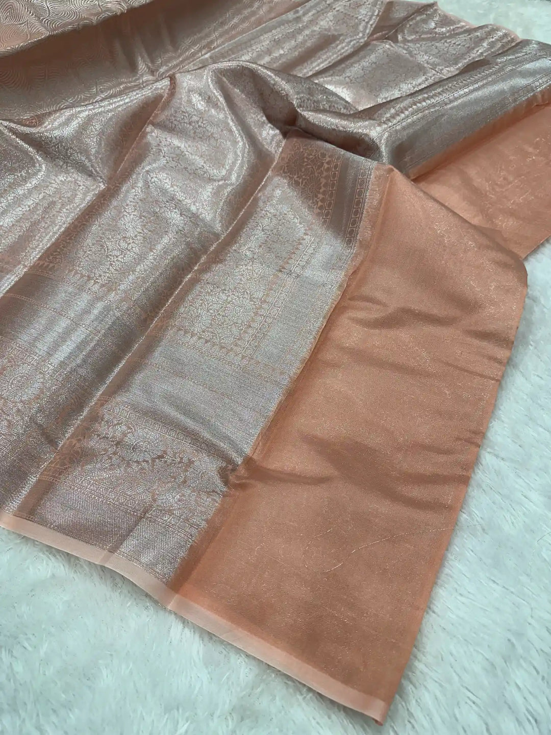 Silver zari embossed weave peach tissue saree