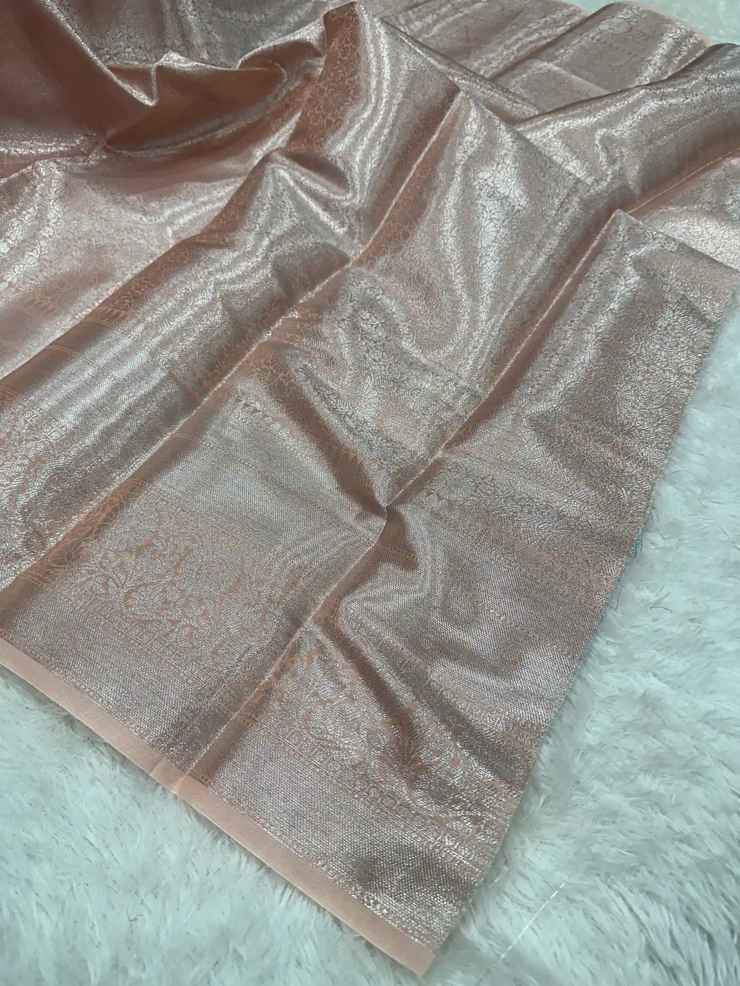 Silver zari embossed weave peach tissue saree