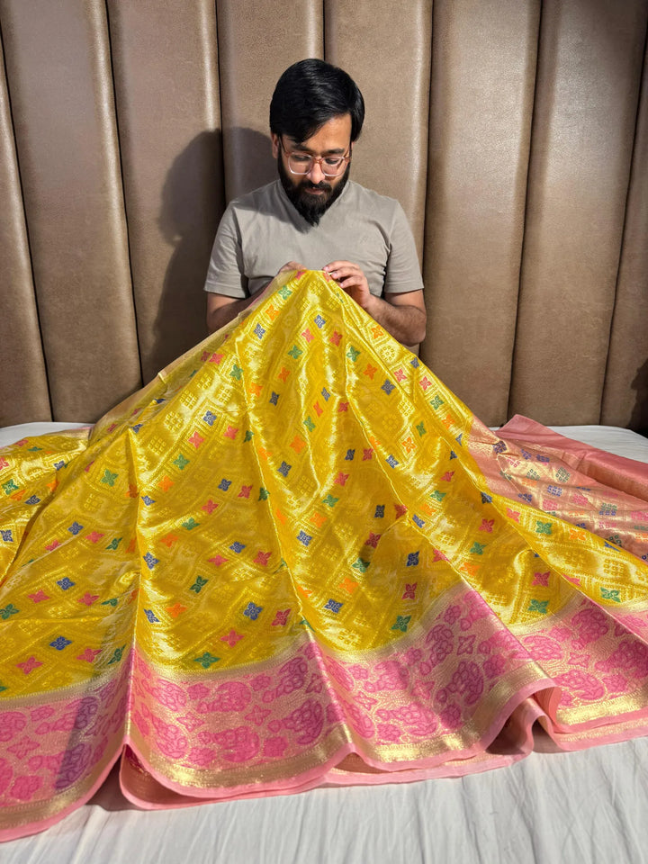 Special yellow tissue organza silk saree with rich pallu and blouse